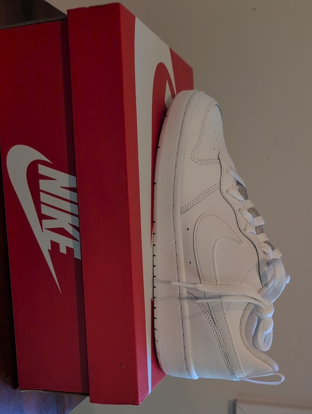 Nike Kids Court Borough Low 2: White Low-Top Sneakers with Classic Swoosh